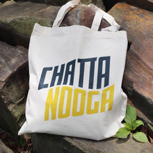 Load image into Gallery viewer, Chattanooga Canvas Tote Bag on Tennessee River rocks
